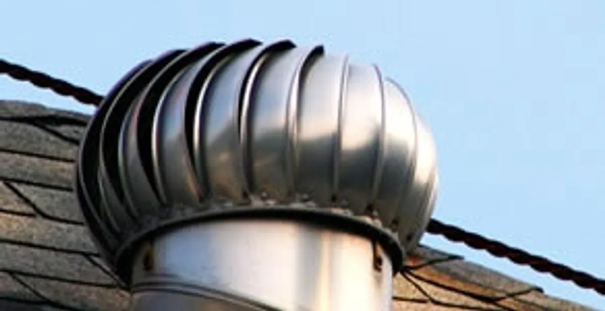 attic fan installation services with professionally installed roof ventilation unit in Seattle, WA