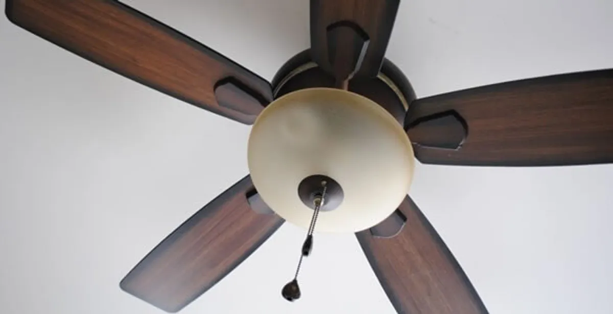 Fully installed ceiling fan with balanced blades and light fixture in Seattle, WA