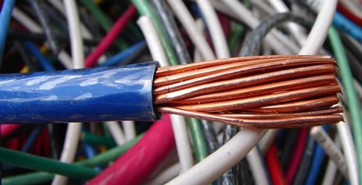 electrical wiring services showing exposed copper conductors and cable preparation in Seattle, WA