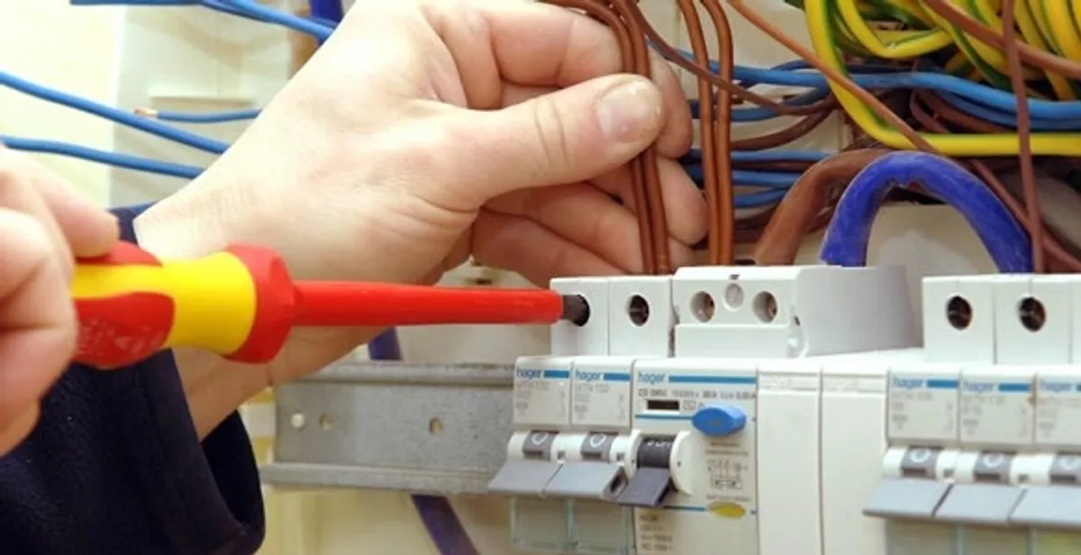 electrician services performing professional electrical panel wiring and connections in Seattle, WA