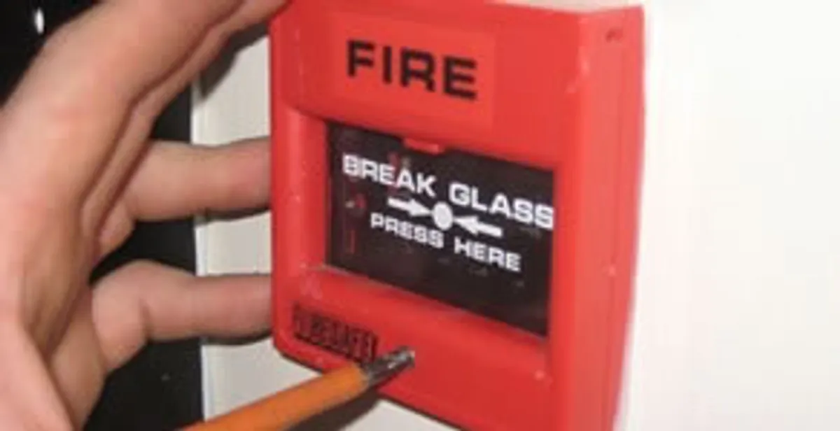 fire alarm installation service showing manual fire alarm pull station installed by licensed electricians in Seattle, WA