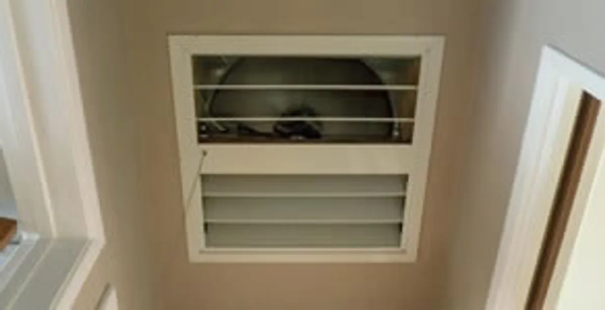 whole house fan installation services with ceiling-mounted ventilation system in Seattle, WA